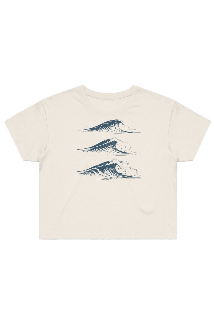 Drift Studies women's cropped tee in Ecru with deep navy wave artwork on the front