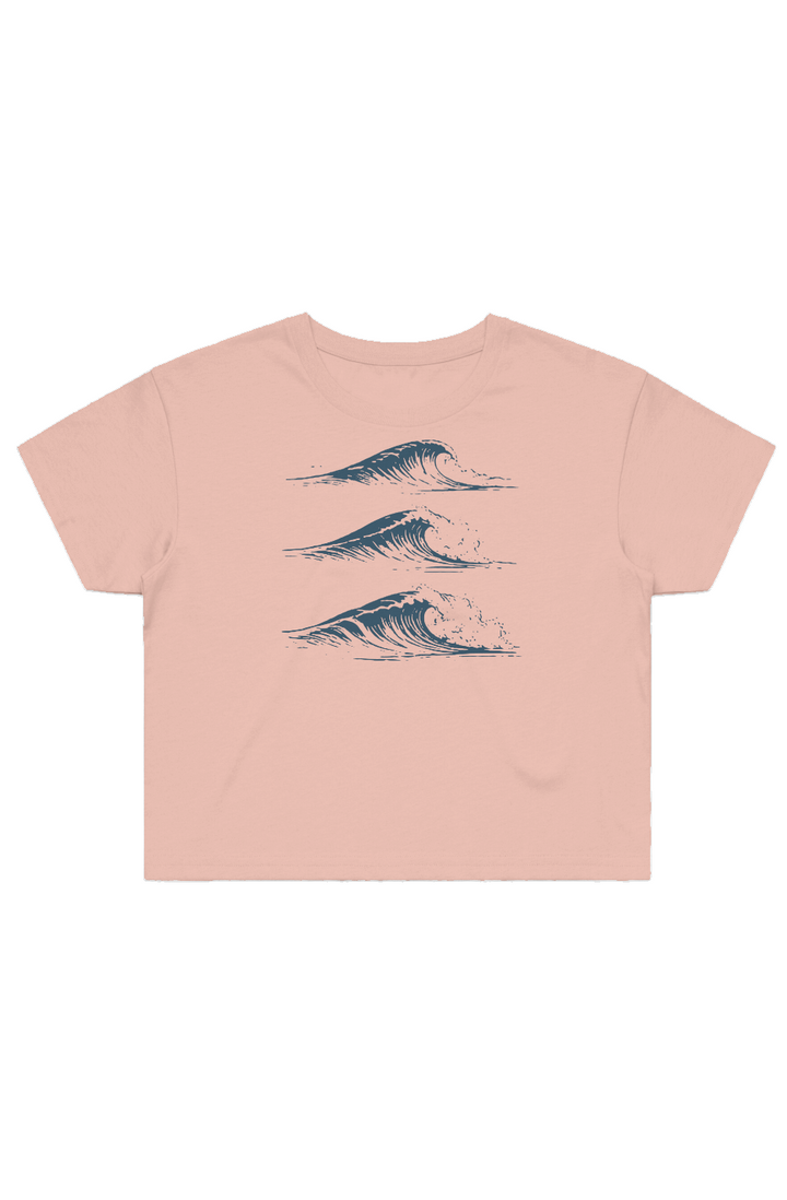 Drift Studies women's cropped tee in Pale Pink featuring three stacked navy breaking-wave illustrations